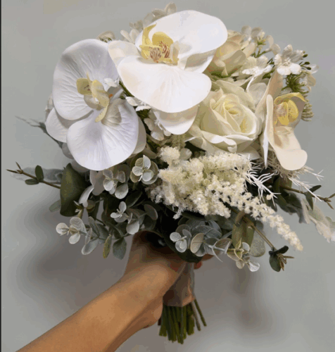 White orchid and rose bridal bouquet photo review